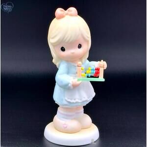 Precious Moments Blonde Girl Figurine with Abacus – Counting Cuteness!